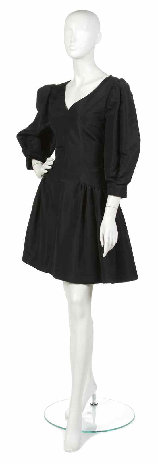 Appraisal: A Pauline Trigere Black Silk Cocktail Dress wide 'V' neckline