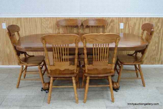 Appraisal: Oak Double Pedestal Dining Table ChairsFrom an estate is a