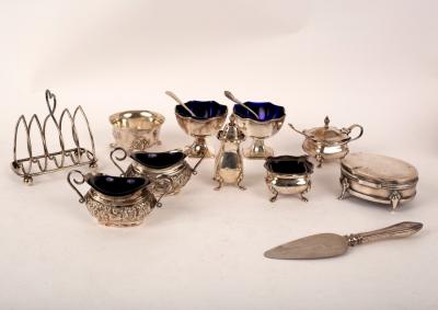 Appraisal: A quantity of silver cruets a silver toast rack etc