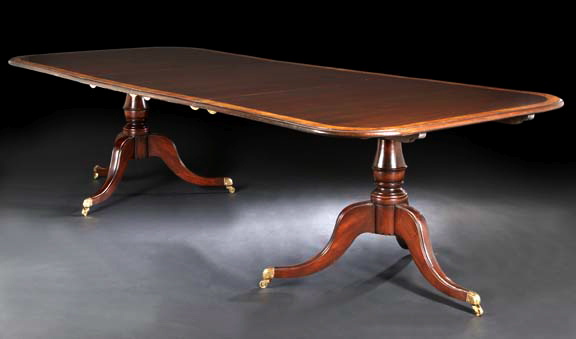 Appraisal: George III-Style Mahogany Dining Table the rounded rectangular top with