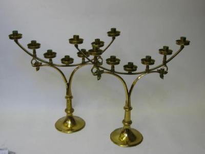 Appraisal: A PAIR OF BRASS CANDELABRA c each with seven turned