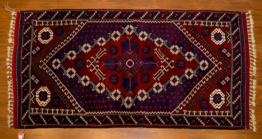 Appraisal: Turkish Yagcibedir Rug x hand knotted wool foundation Condition Appears