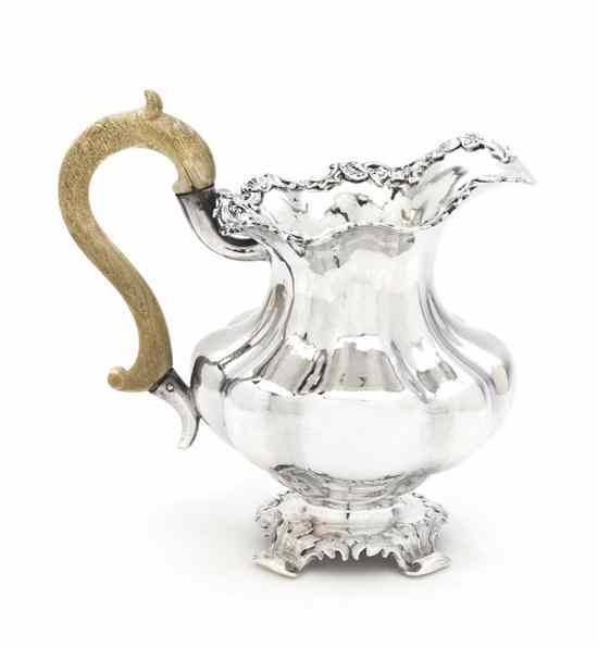 Appraisal: A Russian Silver Creamer Moscow having assay mark of Andrei