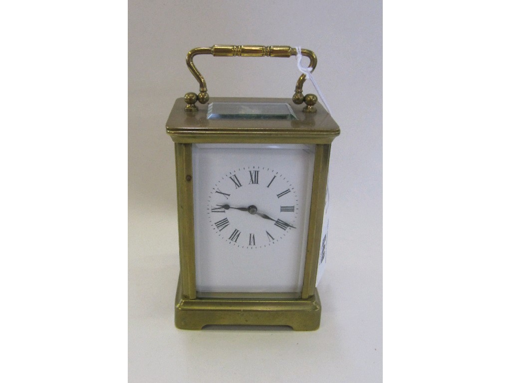 Appraisal: Brass cased carriage clock with white enamel face and Roman