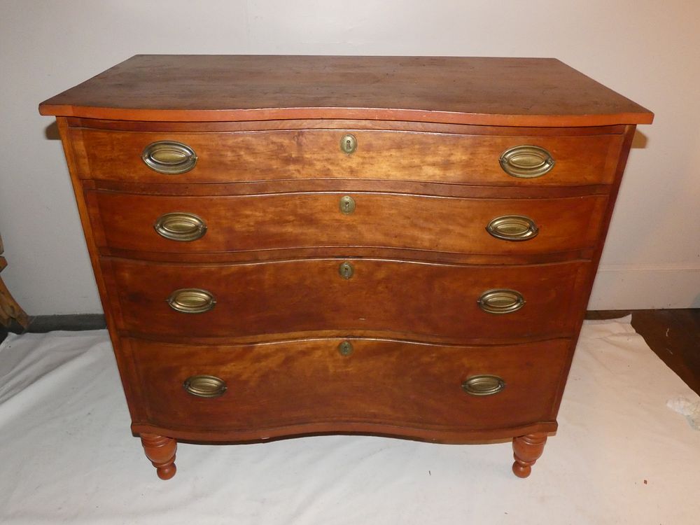 Appraisal: PERIOD SERPENTINE CHEST Period American cherry or birch serpentine front