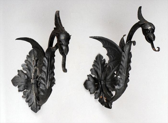 Appraisal: Pair of Arts and Crafts Wrought-Iron Winged Serpent-Form Ornaments x