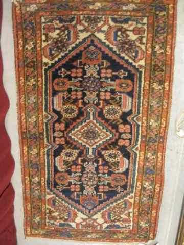 Appraisal: Hamadan Persian Handmade Rug geometric florals primarly reds blues ivory