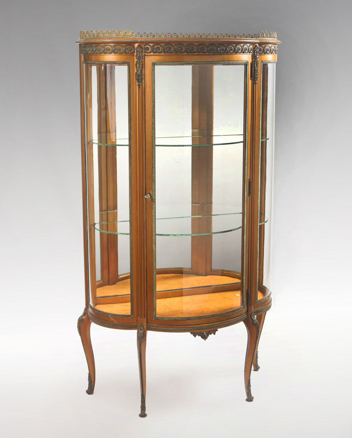 Appraisal: BOW FRONT VITRINE DISPLAY CABINET Gallery top bow front vitrine