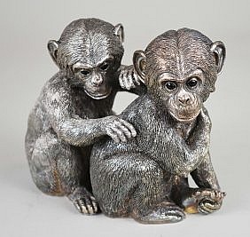 Appraisal: PAIR OF SILVERED METAL MONKEYSModern Possibly English One variously marked