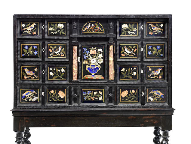 Appraisal: A Florentine pietre dure ebony and ebonised cabinet on stand