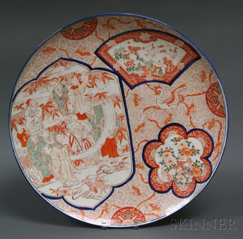 Appraisal: Porcelain Charger Japan th century Imari ware reserves decorated with