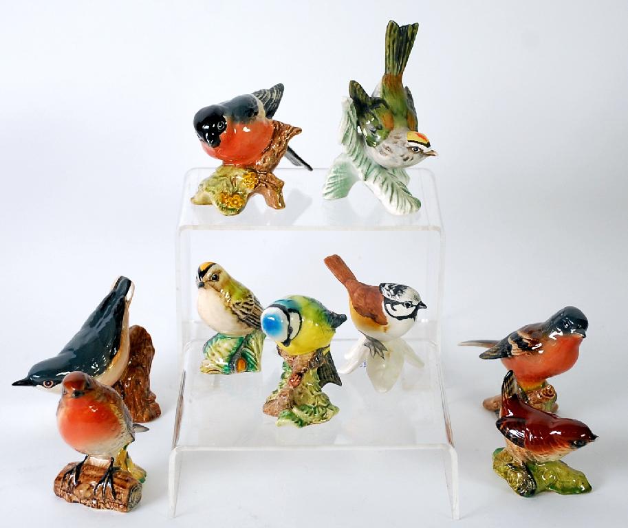 Appraisal: COLLECTION OF SEVEN BESWICK POTTERY MODELS OF BIRDS Comprising Wren