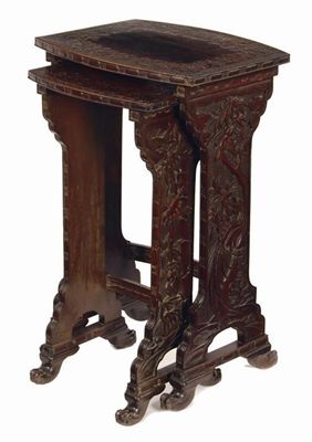 Appraisal: Two Oriental carved hardwood occasional tables from a nest the