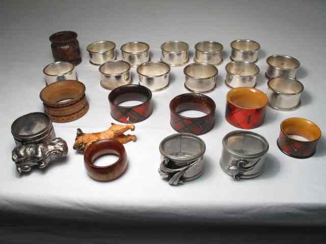 Appraisal: Lot of assorted napkin rings total Includes silver plated carved