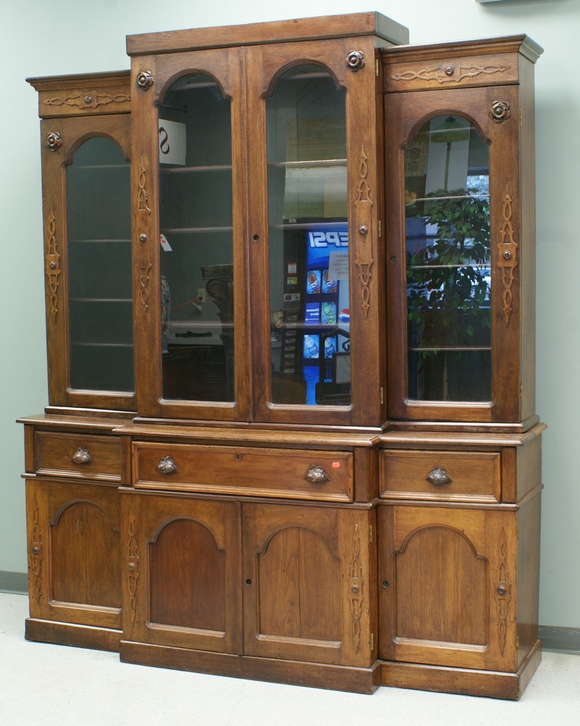 Appraisal: Two part walnut breakfront book case with desk drawer w