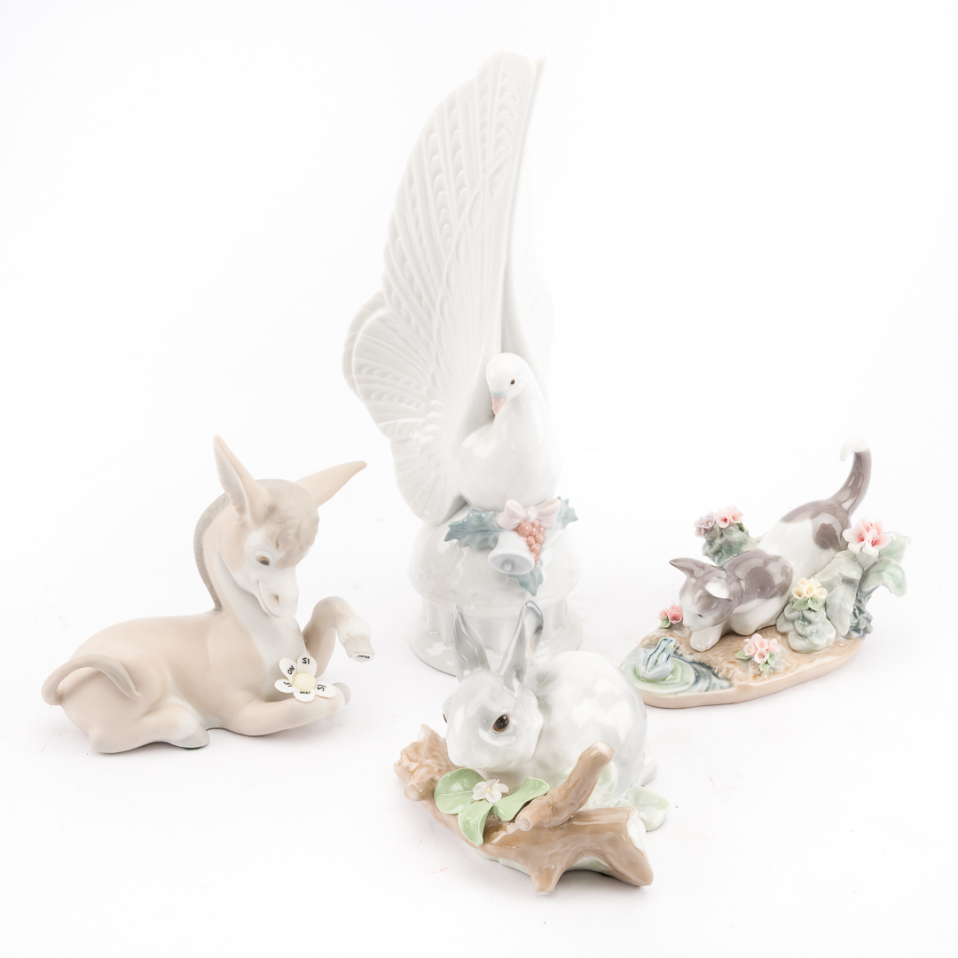 Appraisal: Four Lladro porcelain animals including Message of Peace Christmas tree