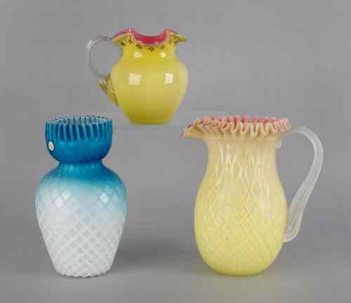 Appraisal: Two overlay glass pitchers one in a quilted diamond pattern