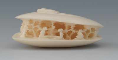 Appraisal: A Carved Ivory Anabori Netsuke In the shape of a