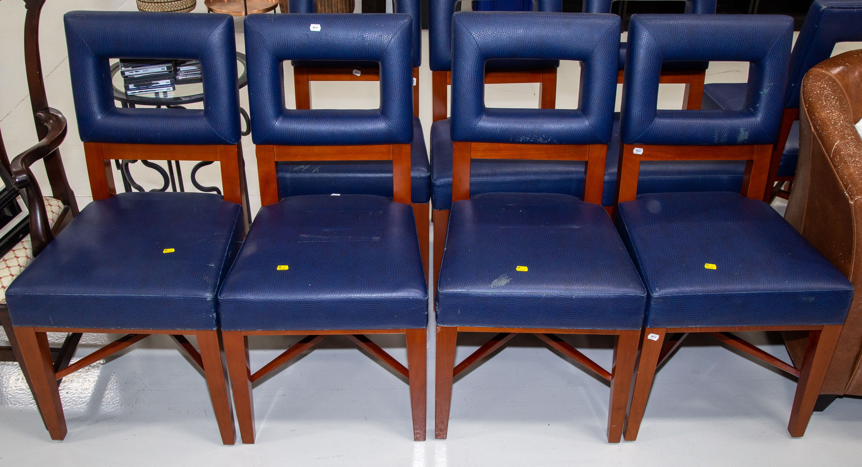 Appraisal: SEVEN CONTEMPORARY SIDE CHAIRS With imitation blue ostrich skin upholstery