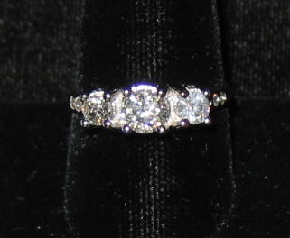 Appraisal: DIAMOND PAST PRESENT FUTURE RING k white gold set with