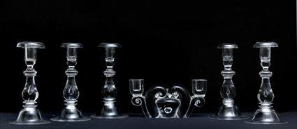 Appraisal: FIVE STEUBEN GLASS TEAR DROP TABLE CANDLESTICKS AND A TWO-LIGHT