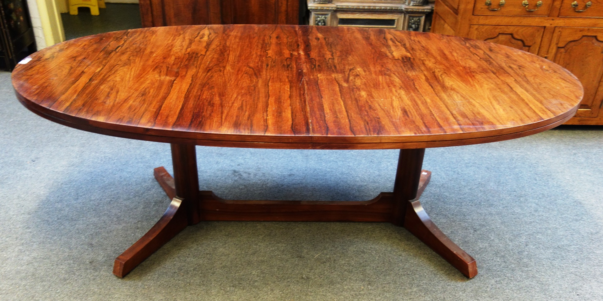 Appraisal: Archie Shine a mid- th century rosewood oval extending dining