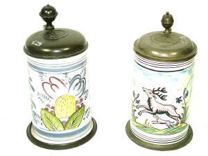 Appraisal: Two German pottery tankards with pewter covers and mounts one