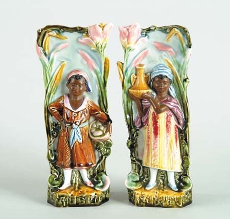 Appraisal: PAIR OF MAJOLICA VASES WITH MOOR BOY AND GIRL Decorative