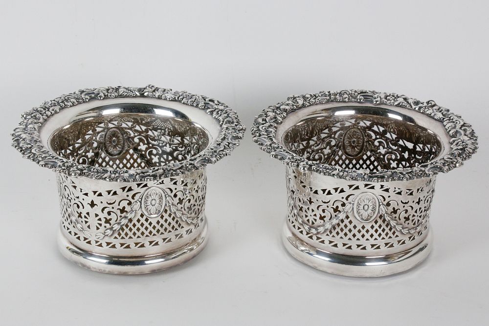 Appraisal: Pair of Sheffield Silver Plated Wine Coaster th Century Pair