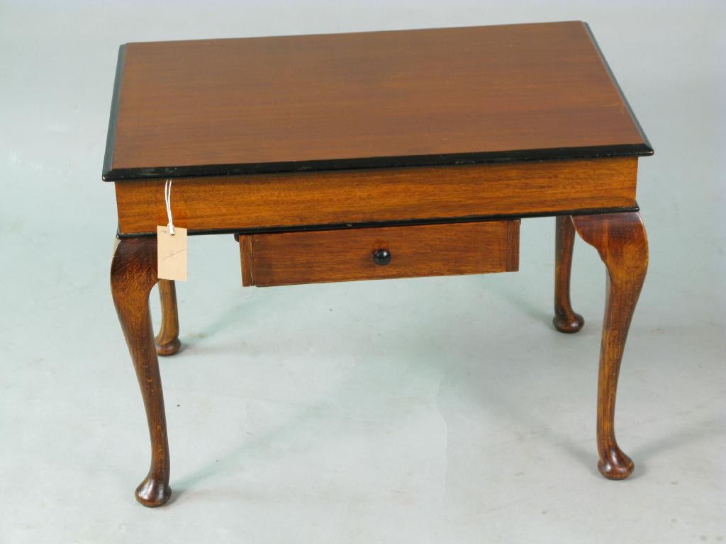 Appraisal: A mahogany occasional table with drawer on cabriole legs ft