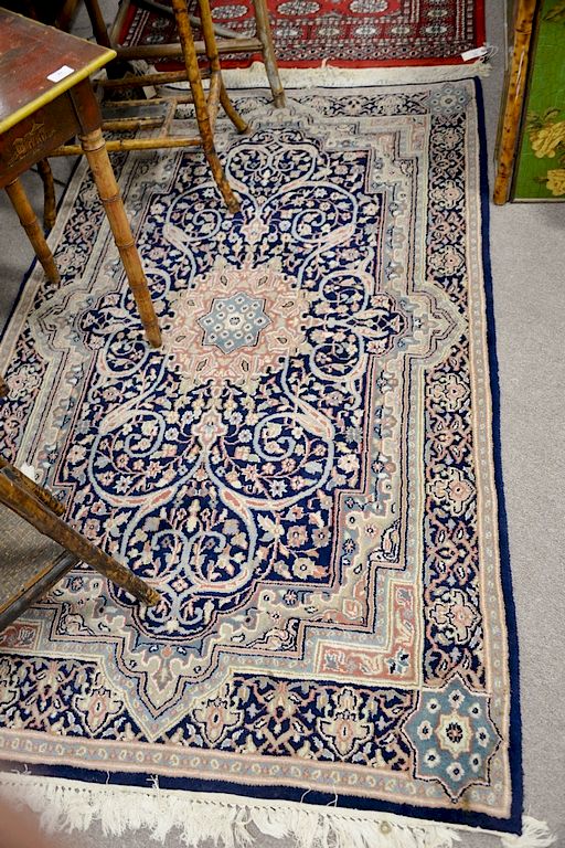 Appraisal: Two Oriental throw rugs ' x ' and ' x