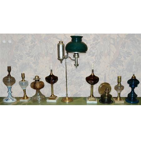 Appraisal: Group of Nine Metal Mounted Glass Fluid Lamps Estimate -