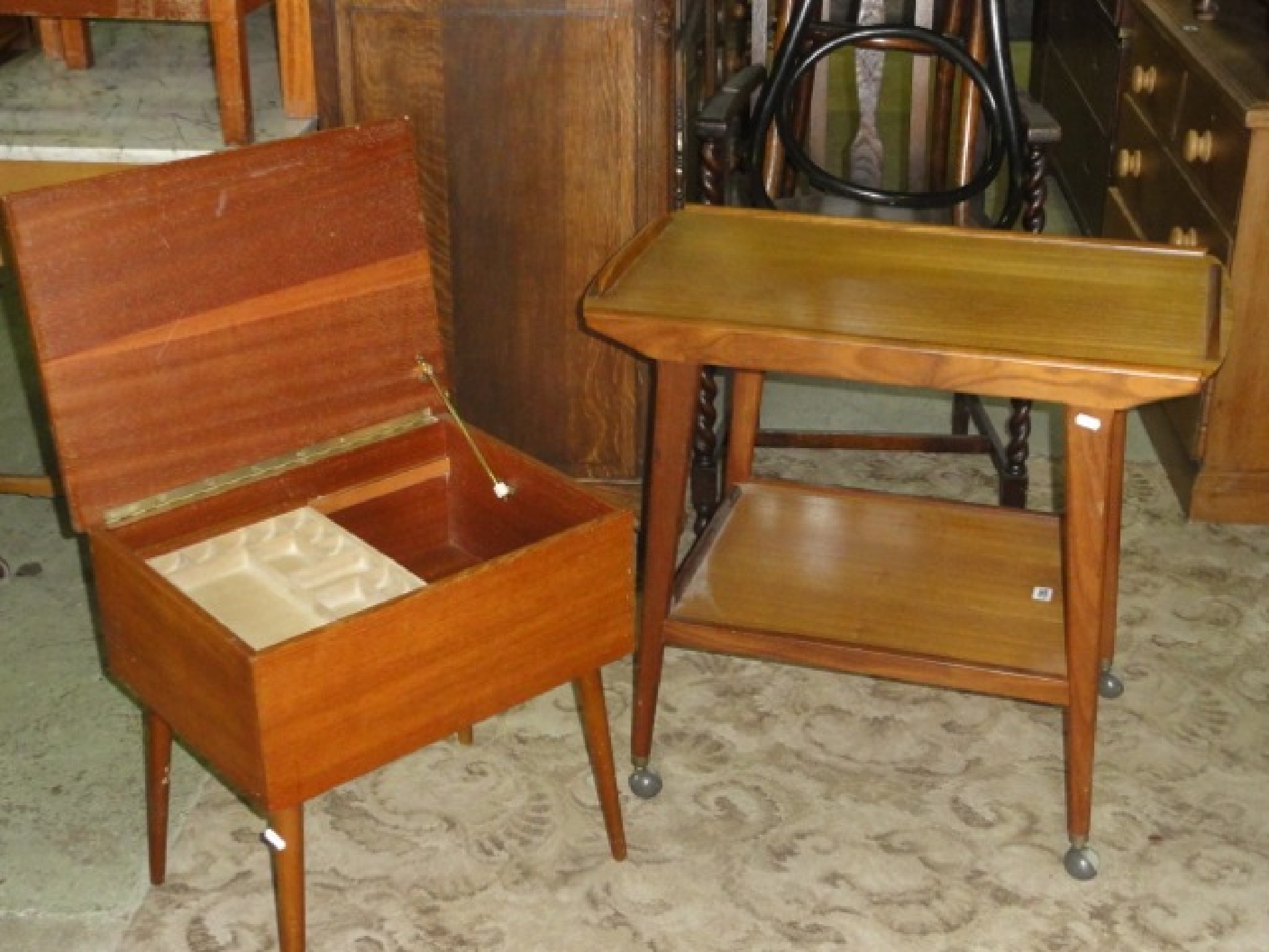 Appraisal: A Remploy teak two tier tea trolley of rectangular form