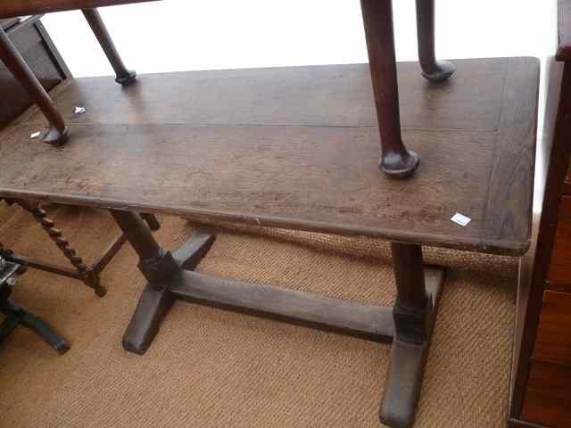 Appraisal: AN OAK REFECTORY TABLE the twin plank top with cleated