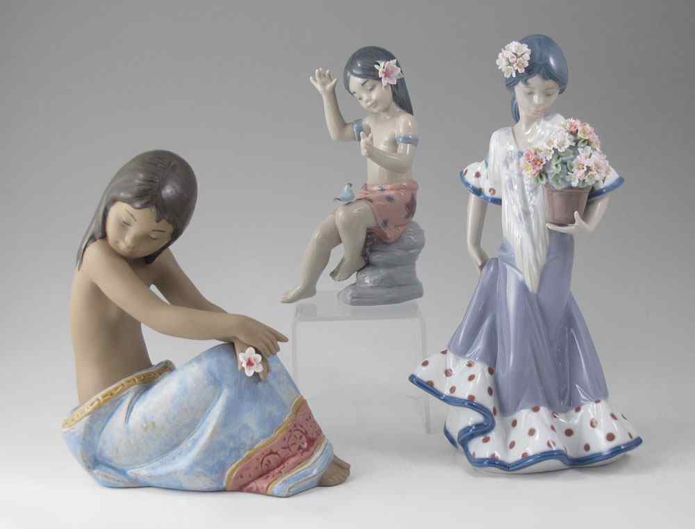 Appraisal: LLADRO PORCELAIN FIGURINES NATURAL WONDER Miguel Santaeulalia sculptor issued retired