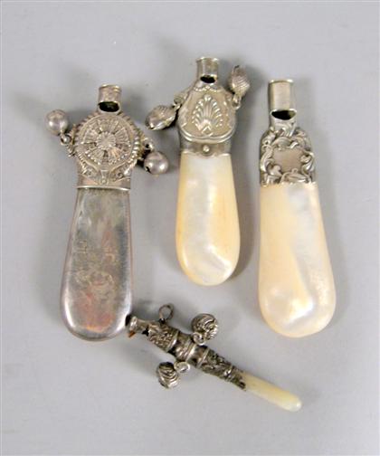 Appraisal: Group of four silver and mother of pearl whistle rattles