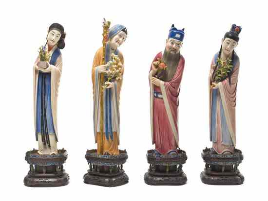 Appraisal: A Set of Four Chinese Polychrome Decorated Ivory Figures the