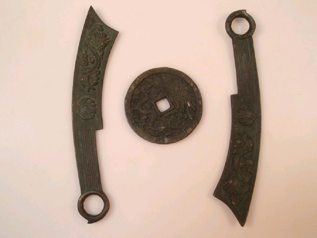 Appraisal: Two Chinese bronze sabre's and medallion cm and cm diameter