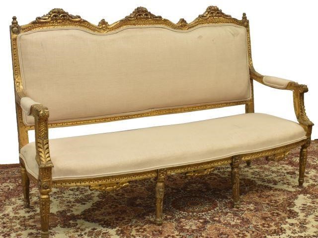 Appraisal: French Louis XVI style giltwood salon sofa having cream upholstery