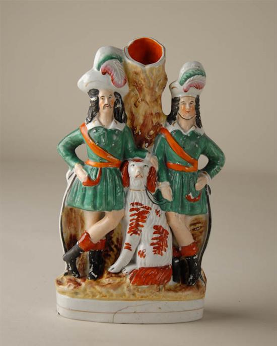 Appraisal: A Staffordshire Pottery Figural Spill Vase with two Scottish men