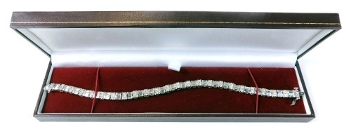 Appraisal: A diamond line bracelet set with alternate set of baguette