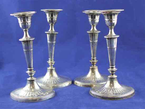 Appraisal: A set of four late Victorian silver candlesticks of navette