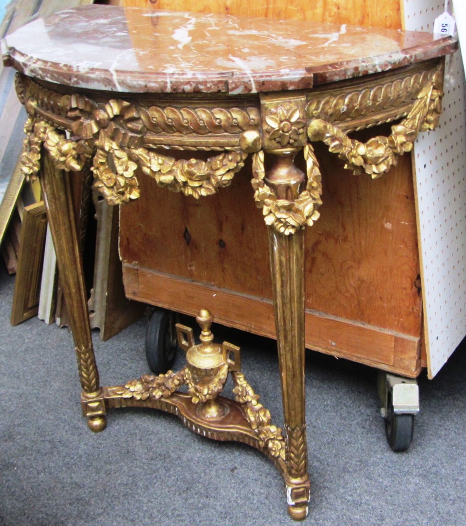 Appraisal: A late th century French console table the shaped demi