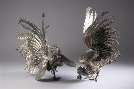 Appraisal: LARGE PAIR CONTINENTAL SILVER PLATED ROOSTERS In fighting stance with