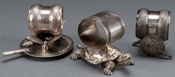 Appraisal: VICTORIAN SILVERPLATE FIGURAL NAPKIN RINGS THREE FINE VICTORIAN SILVER PLATE