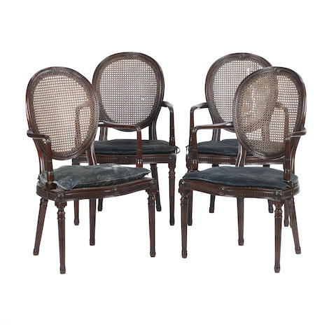 Appraisal: A set of four Edwardian mahogany open armchairs in the