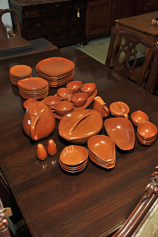 Appraisal: SET OF ROSEVILLE RAYMOR DINNERWARE In burnt orange and consisting