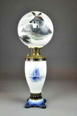 Appraisal: LARGE DELFT HAND-PAINTED LAMPVery nice oil lamp with hand-painted scenes