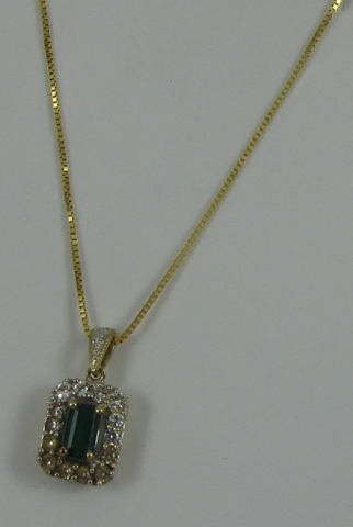 Appraisal: EMERALD DIAMOND AND YELLOW GOLD PENDANT NECKLACE the k yellow