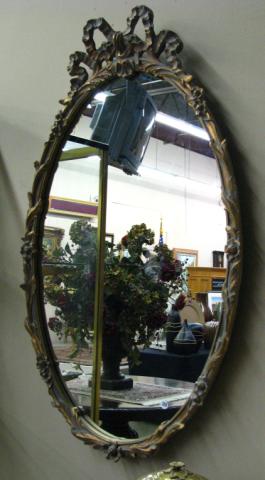 Appraisal: French style oval wall mirror composition frame in Louis XV